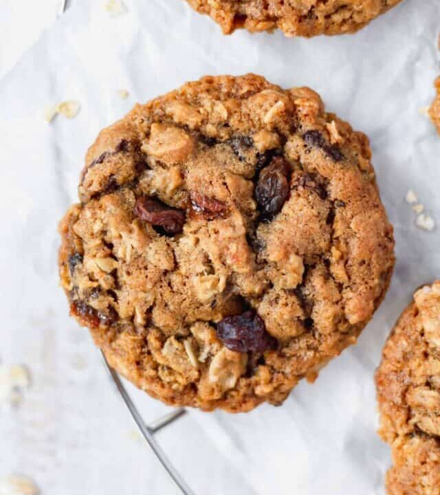These chewy oatmeal raisin cookies are irresistible! Browned butter, brown sugar, cinnamon, and nutmeg make these cookies soft and delicious! #oatmealcookies #oatmealraisin #cinnamon #nutmeg #rolledoats