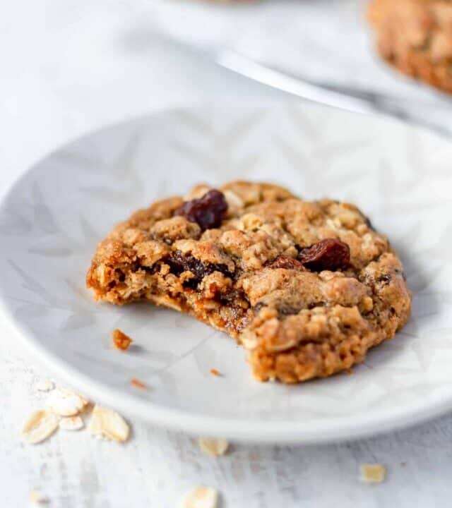 These chewy oatmeal raisin cookies are irresistible! Browned butter, brown sugar, cinnamon, and nutmeg make these cookies soft and delicious! #oatmealcookies #oatmealraisin #cinnamon #nutmeg #rolledoats
