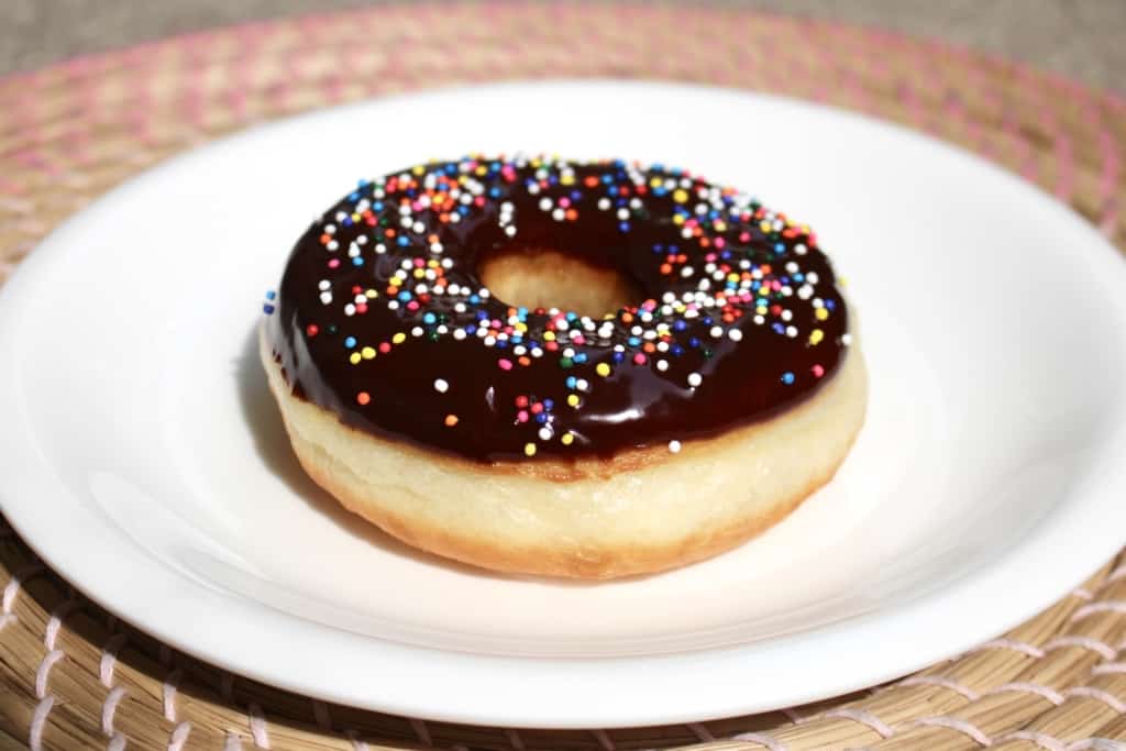 Did you know you can make fluffy and delicious yeasted doughnuts in a bread machine? These homemade doughnuts are going to knock your socks off! Glazed, dipped into chocolate, or covered in cinnamon sugar, do what you want! Go nuts with your doughnuts! #donuts #doughnuts #fluffy #homemade #yeasted #glazed #chocolate #sprinkles #doughnutholes #timbits #dunkindonuts #krispykreme #timhortons #breadmachines #fried