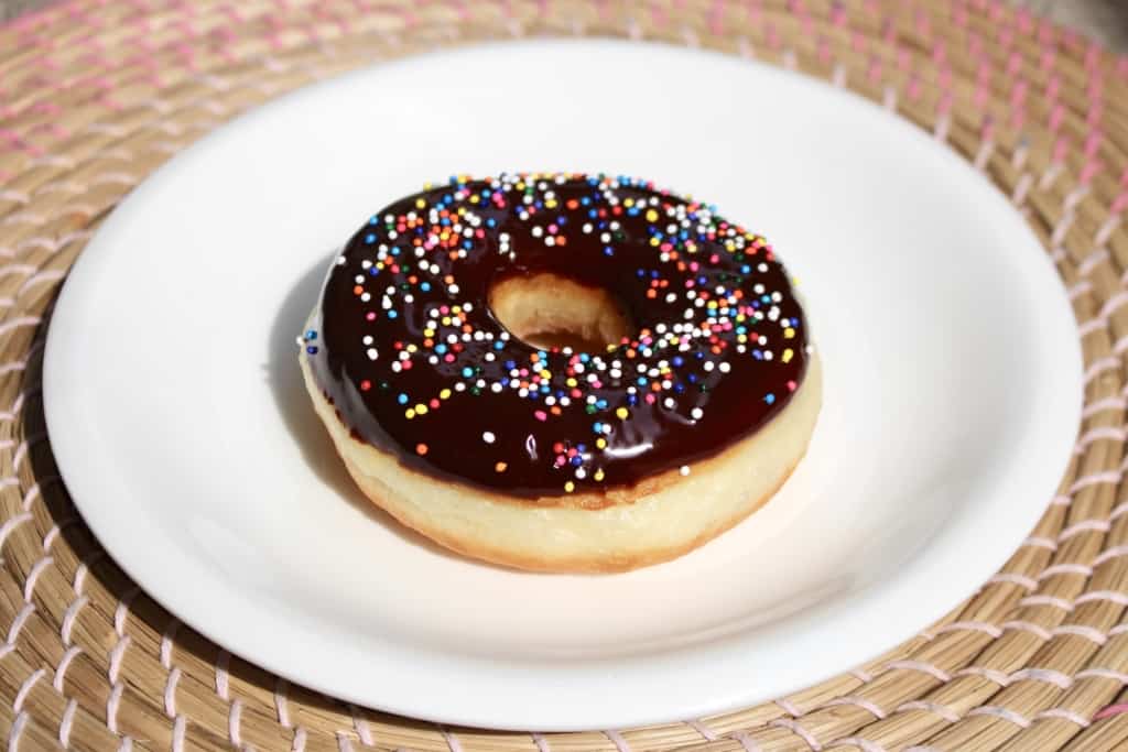 Did you know you can make fluffy and delicious yeasted doughnuts in a bread machine? These homemade doughnuts are going to knock your socks off! Glazed, dipped into chocolate, or covered in cinnamon sugar, do what you want! Go nuts with your doughnuts! #donuts #doughnuts #fluffy #homemade #yeasted #glazed #chocolate #sprinkles #doughnutholes #timbits #dunkindonuts #krispykreme #timhortons #breadmachines #fried