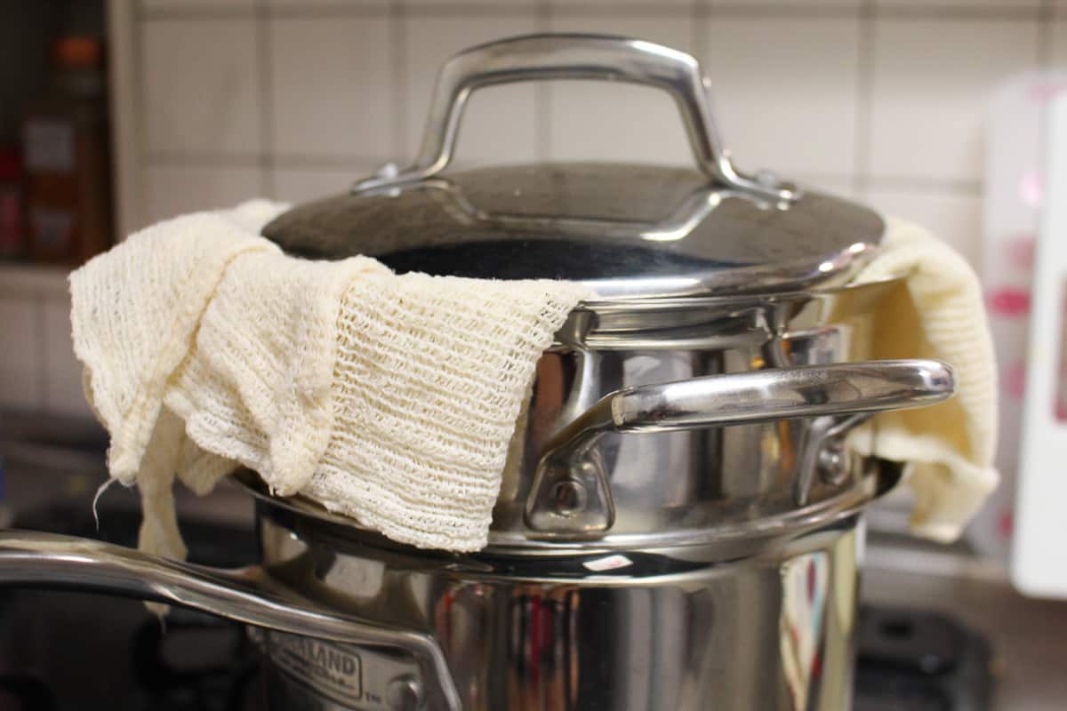 Steamer with a piece of cheesecloth under the lid to prevent drips onto the mochi inside.