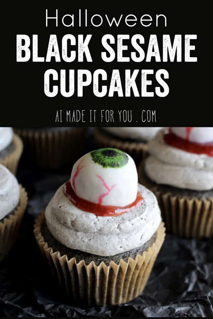 Halloween black sesame cupcakes are the perfect unique treat for an adult Halloween party! These Halloween eyeball cupcakes have a fluffy black sesame cake frosted with black sesame buttercream, topped with my Halloween white chocolate eyeballs! I added a spoonful of berry jam as fake blood, but I think mixing some black tahini with honey to make a spooky black goop would pair better in terms of taste. #halloween #halloweentreats #trickortreat #cupcake #cupcakes #blacksesame #kurogoma #sesame #cake #fluffy #black #spooky #creepy #dessert #halloweenparty #adult #eyeballs #whitechocolate #buttercream #frosting