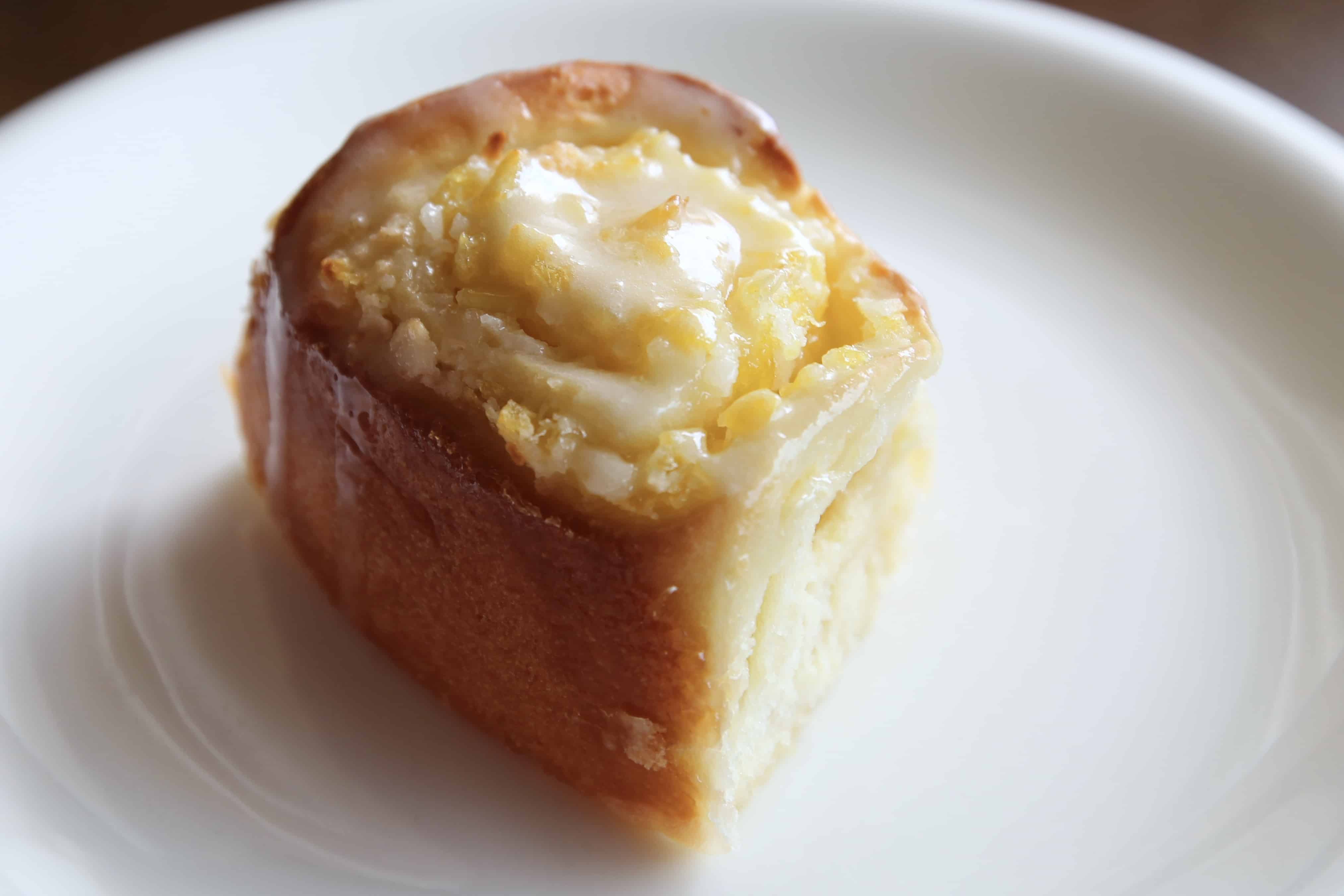 A piña colada roll on a plate