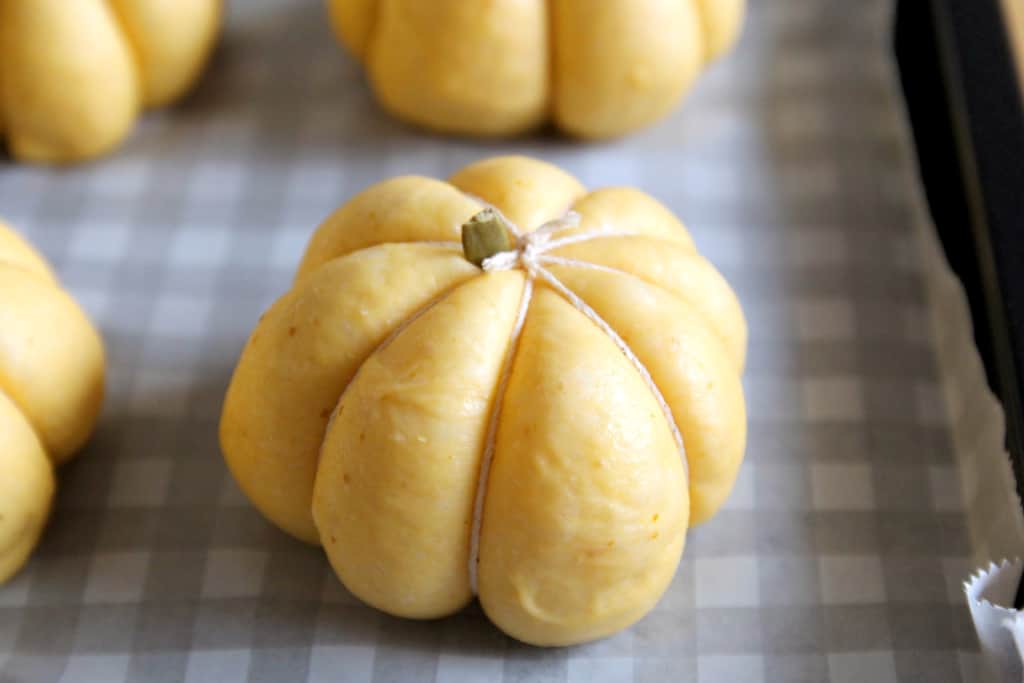 The buns have canned pumpkin in the dough, but the flavor is subtle. Instead they look like cute little pumpkins!