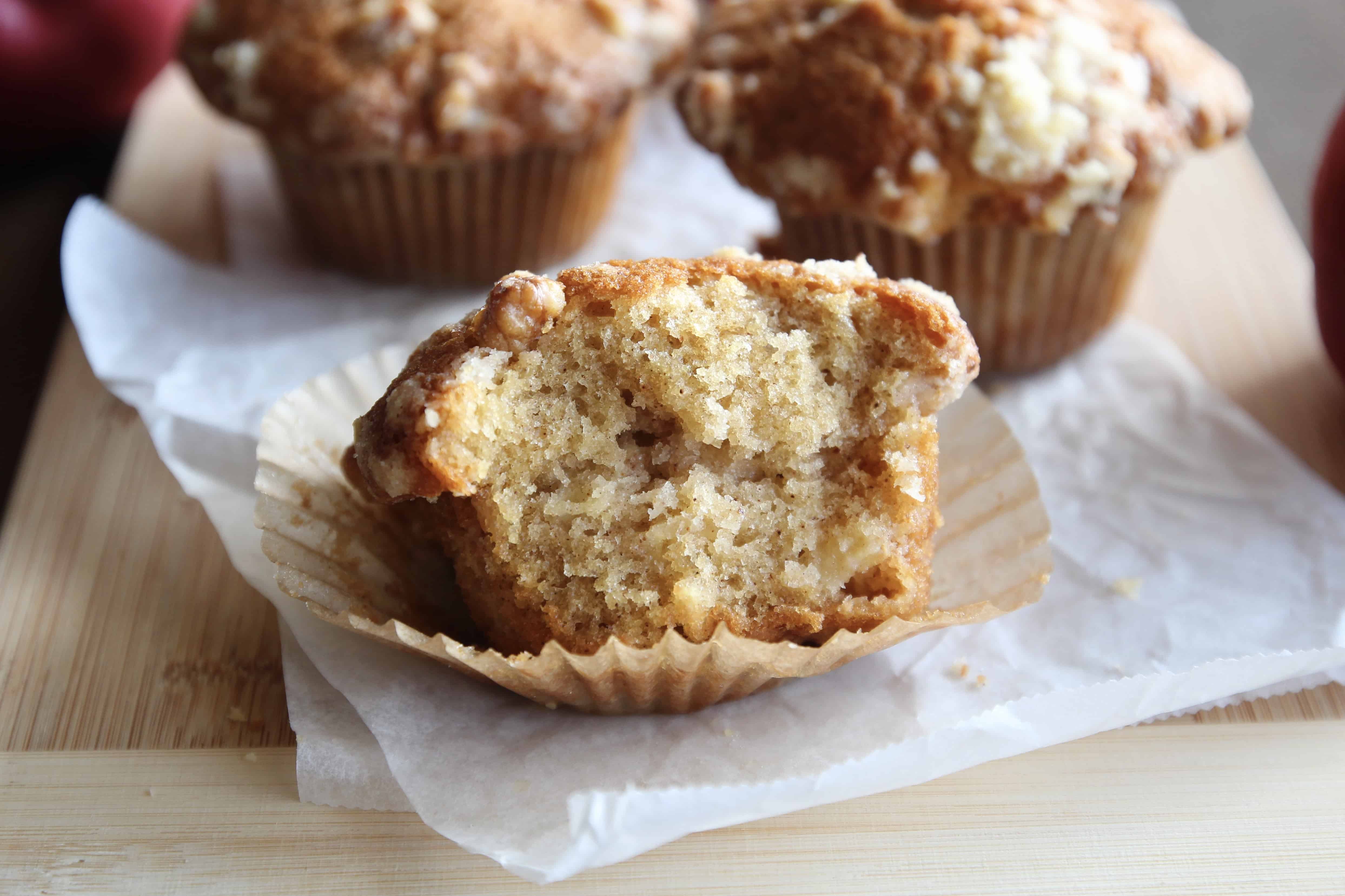 A bitten apple crumble muffin