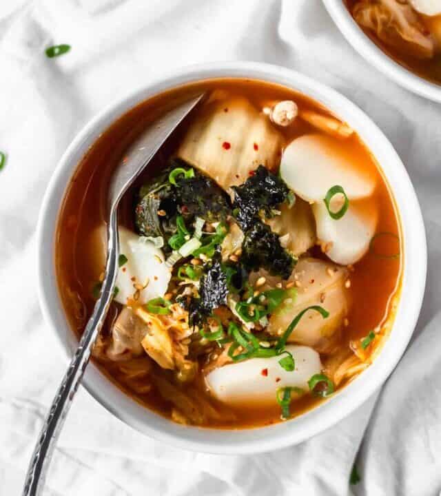 Kimchi soup with Korean tteok rice cakes is spicy, easy, and delicious! #kimchisoup #probiotics #spicysoup #Koreanfood #healthymeals