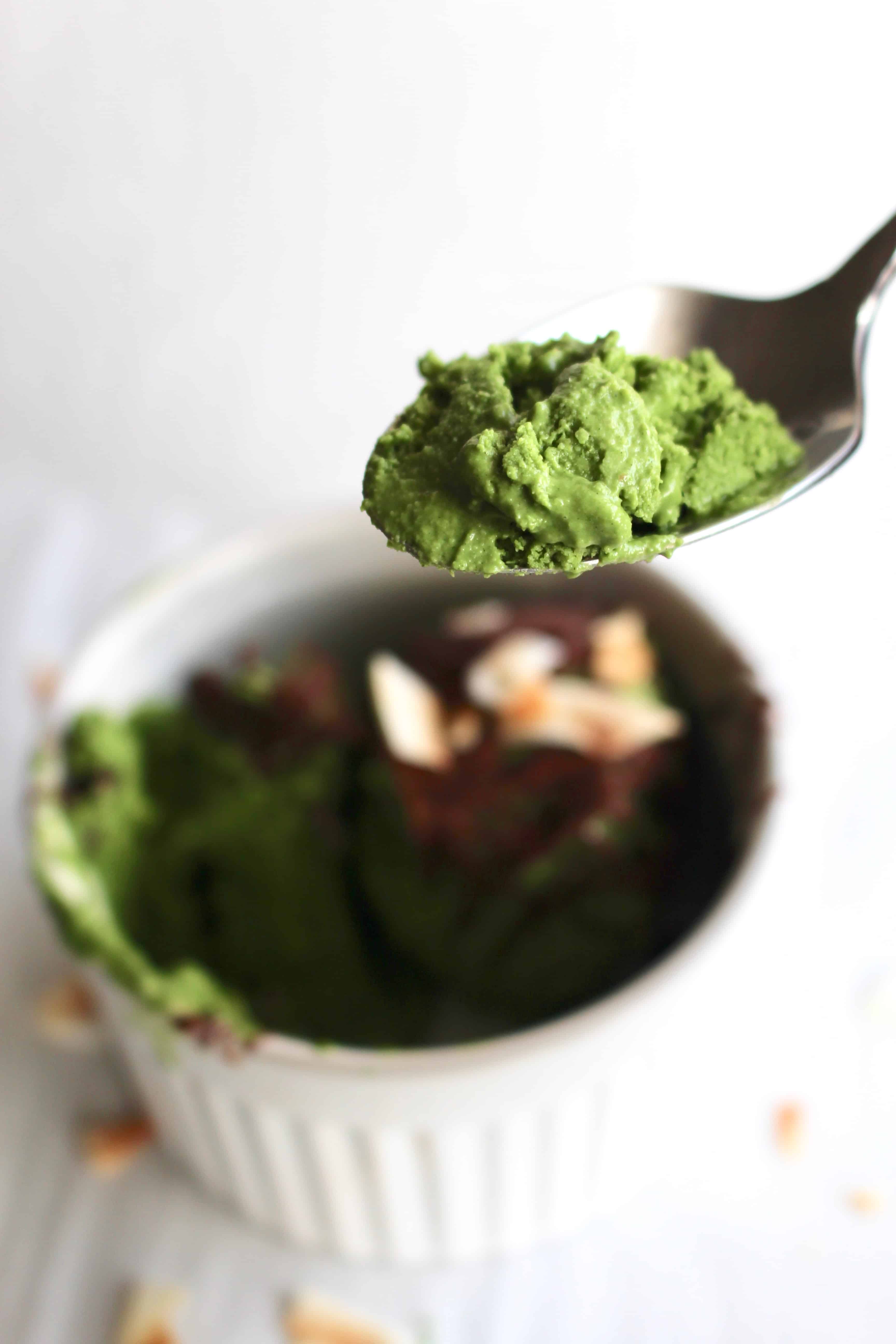 Dairy free matcha ice cream on a spoon