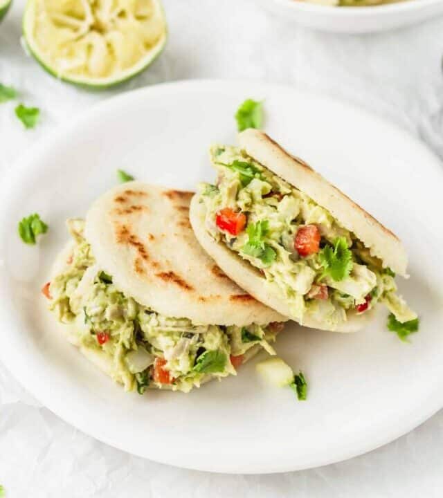 Reina pepiada is a Venezuelan chicken avocado filling for arepas! It's so fresh and satisfying, you'll be making it again and again! #avocado #chickenbreast #chickensalad #arepas #glutenfree