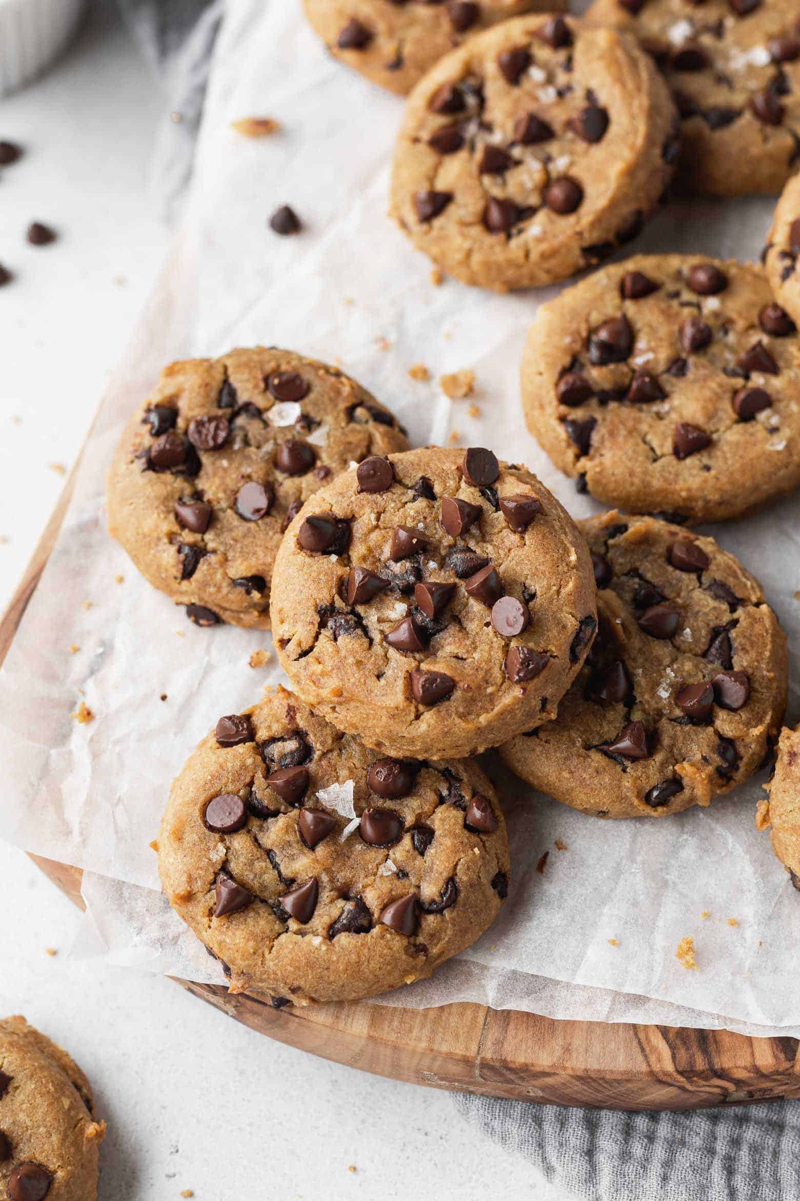 Chocolate chip chickpea cookies on a wooden board