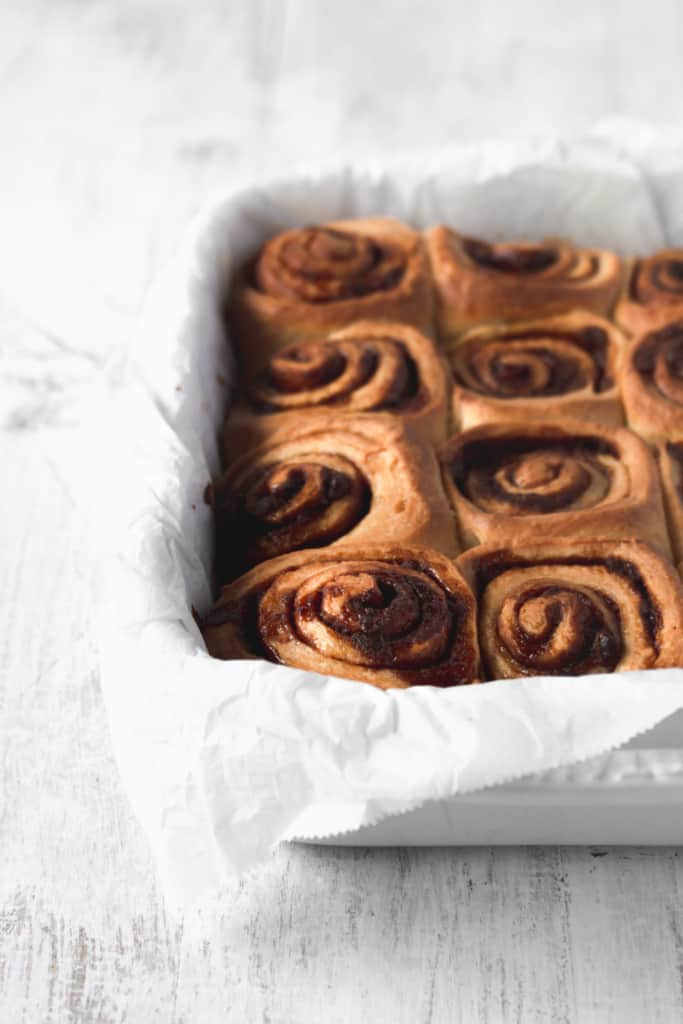 Vegan cinnamon buns fresh out of the oven before covering with icing