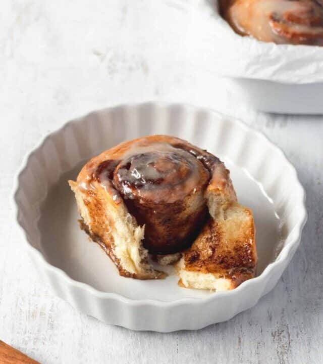 These vegan cinnamon rolls are super easy to make! So fluffy and topped with a cashew cream cheese icing, these vegan cinnamon buns are loved by everyone! #vegancinnamonrolls #cinnamonrolls #cinnamonbuns #veganrecipe #easyrecipe