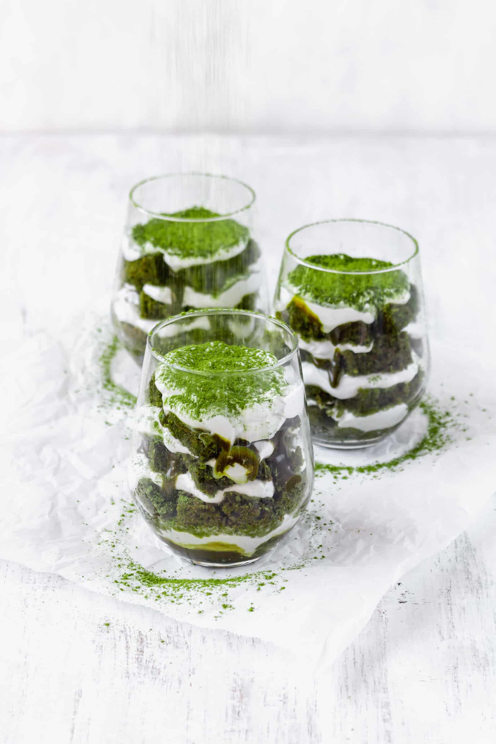 Vegan matcha tiramisu is a Japanese twist on a classic Italian dessert! This recipe has layers of matcha cake, matcha sauce, and coconut whipped cream! #matchadessert #vegantiramisu #matchatiramisu #vegandessert #coconutwhippedcream