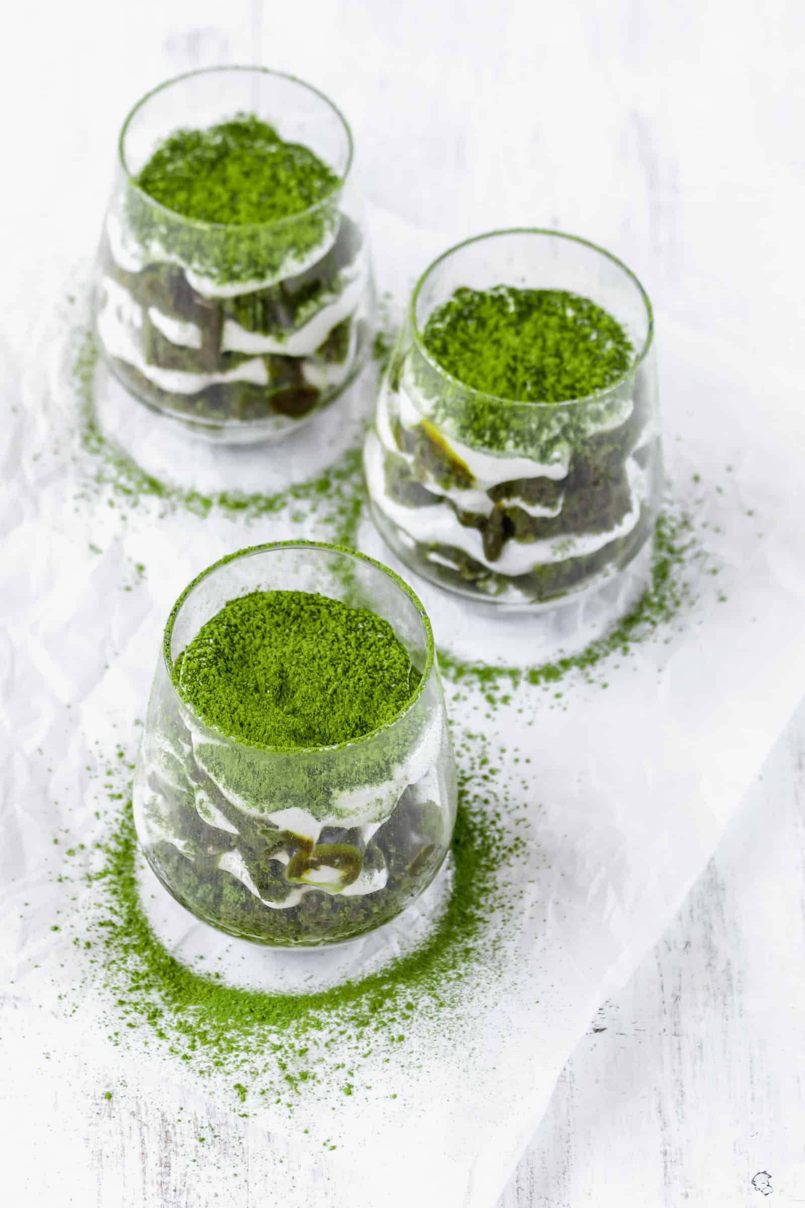 Vegan matcha tiramisu is a Japanese twist on a classic Italian dessert! This recipe has layers of matcha cake, matcha sauce, and coconut whipped cream! #matchadessert #vegantiramisu #matchatiramisu #vegandessert #coconutwhippedcream