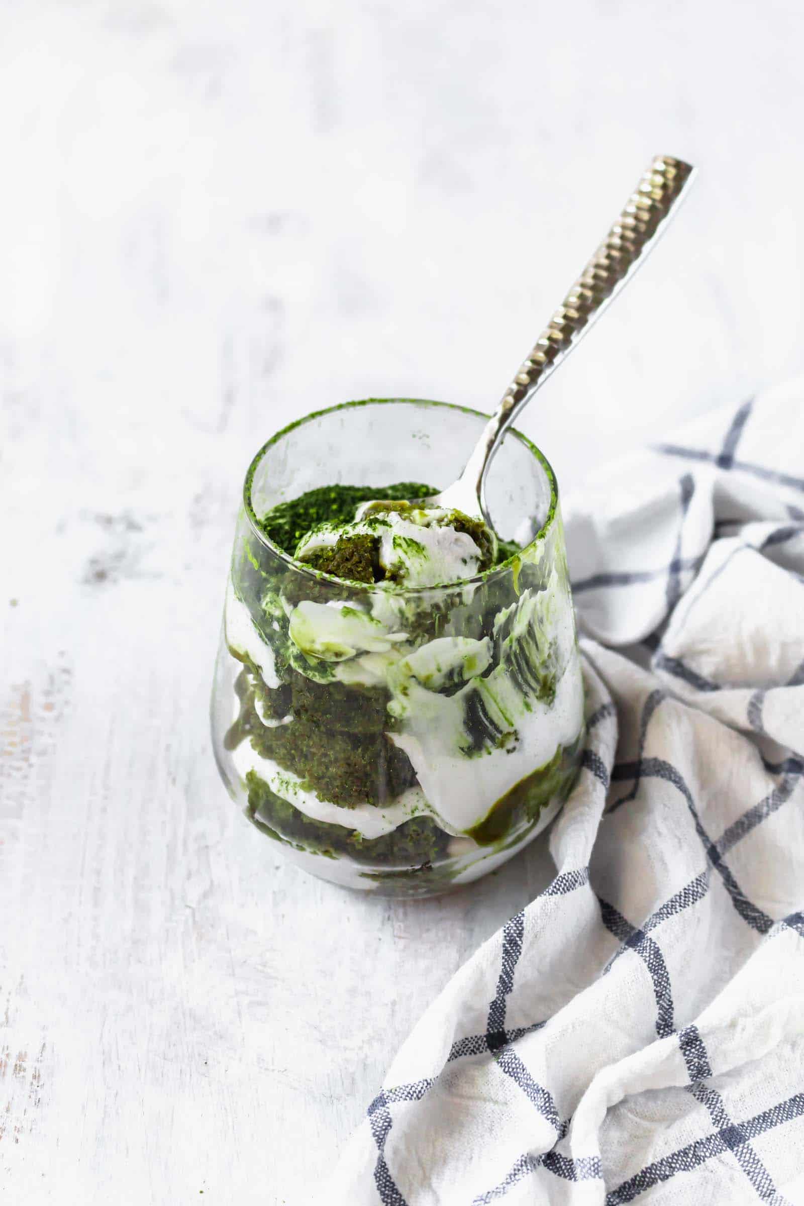 Vegan matcha tiramisu is a Japanese twist on a classic Italian dessert! This recipe has layers of matcha cake, matcha sauce, and coconut whipped cream! #matchadessert #vegantiramisu #matchatiramisu #vegandessert #coconutwhippedcream