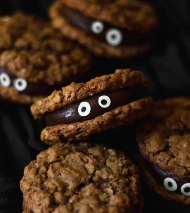 Chocolate fudge sandwiched between two oatmeal cookies make for a delicious and spooky treat!