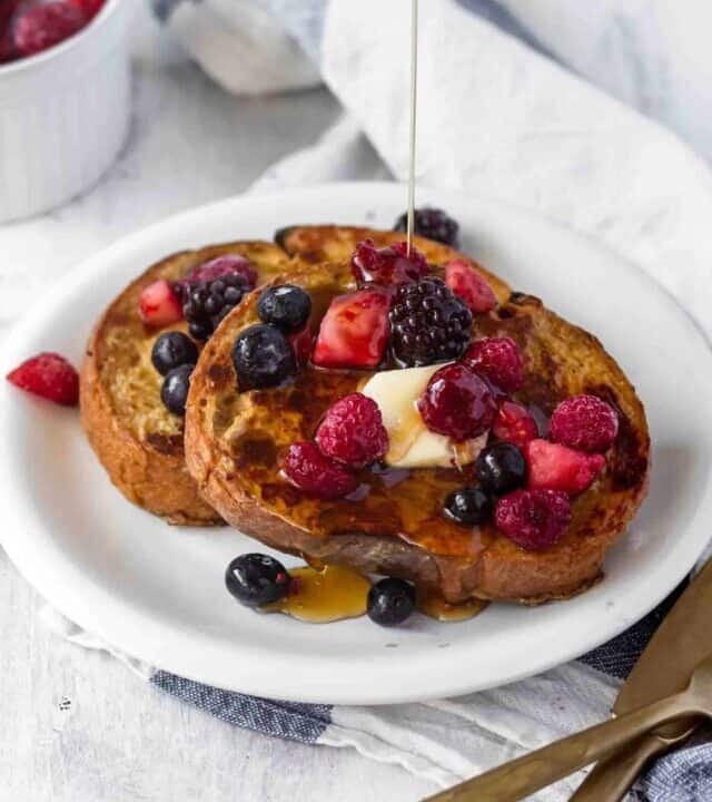 Vegan french toast is easy to make and shockingly delicious! Made with coconut milk and chickpea flour, it's perfect for breakfast or brunch! #veganfrenchtoast #veganbreakfast #veganbrunch #plantbasedmeals #frenchtoast