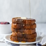 Vegan french toast is easy to make and shockingly delicious! Made with coconut milk and chickpea flour, it's perfect for breakfast or brunch! #veganfrenchtoast #veganbreakfast #veganbrunch #plantbasedmeals #frenchtoast
