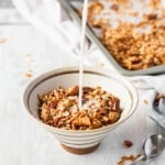 A fun twist on classic granola by adding apples and apple pie spice! A healthy breakfast while enjoying the comforting flavors of apple pie! #applepiegranola #cinnamonapplegranola #applegranola #homemadegranola #healthygranola