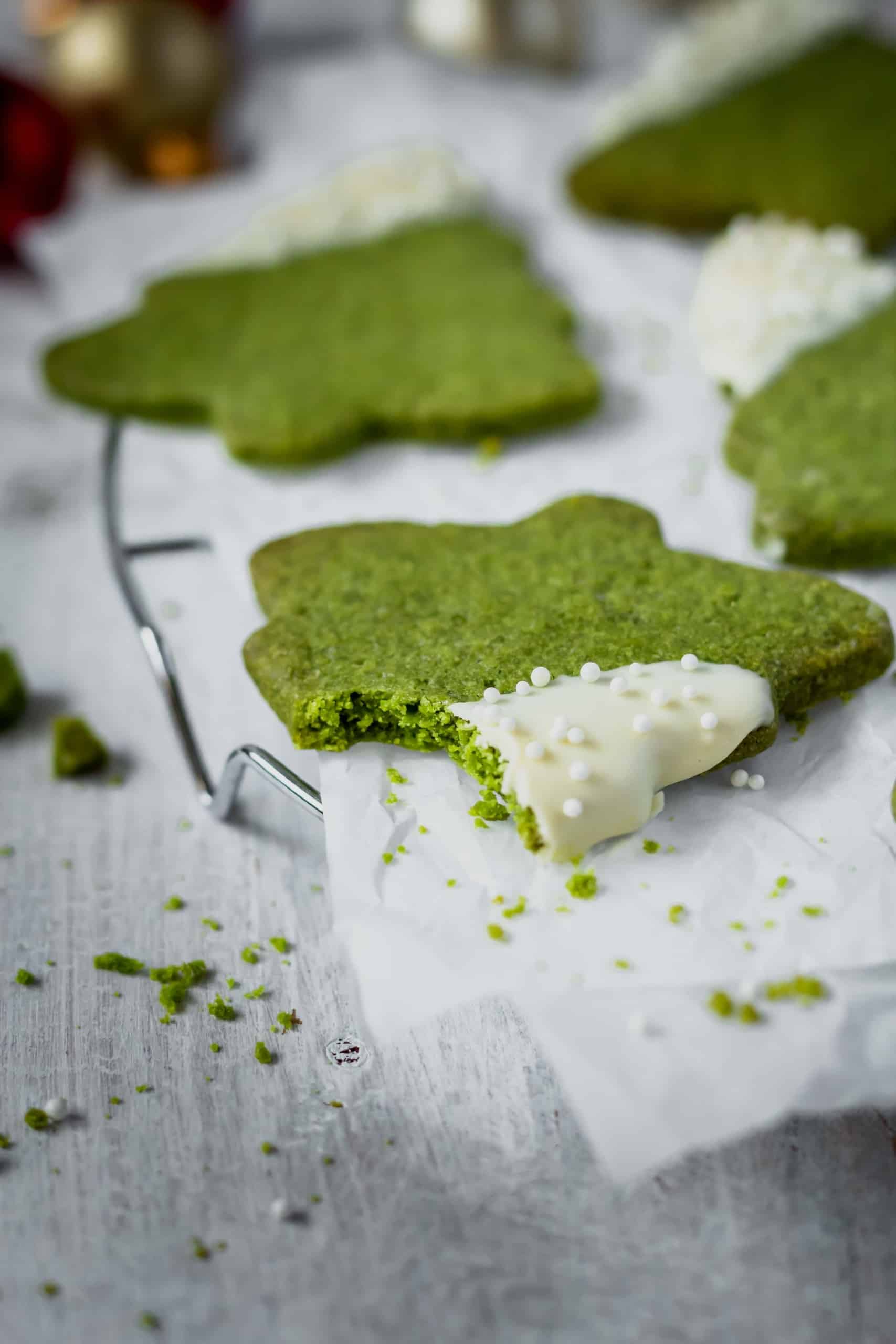 Matcha green tea powder adds a beautiful green hue to these holiday cookies! #christmastree #christmastreecookies #christmascookies #matchacookies #easychristmascookies