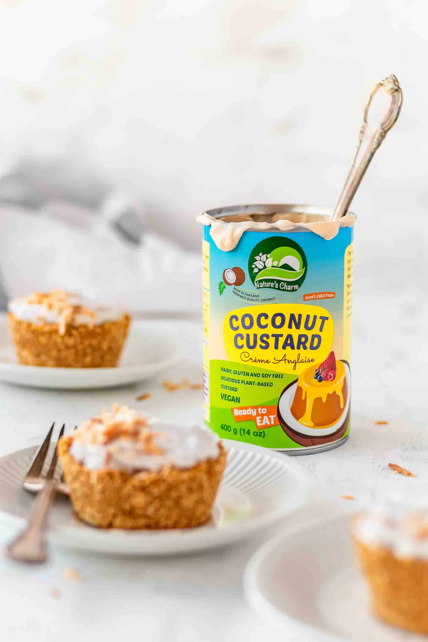 An opened can of coconut custard with a spoon in it