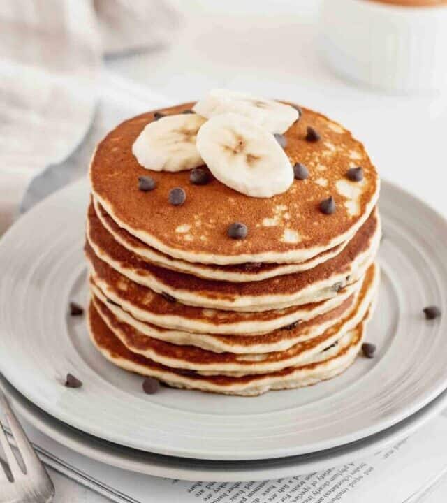 A stack of banana pancakes with chocolate chips