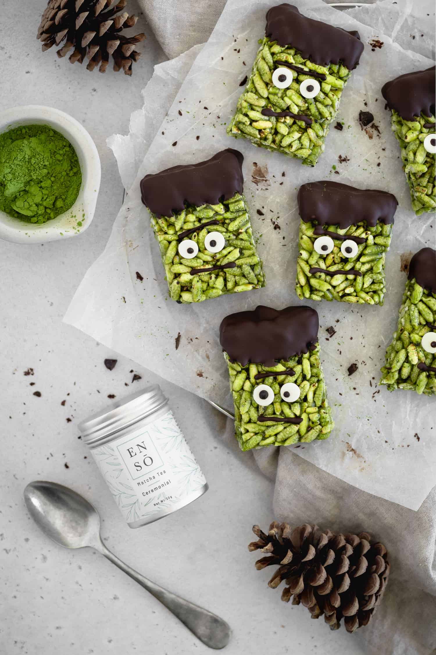 Frankenstein rice crispy treats with a can of matcha powder
