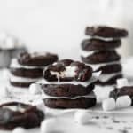 Stacks of marshmallow stuffed gluten-free chocolate cookies