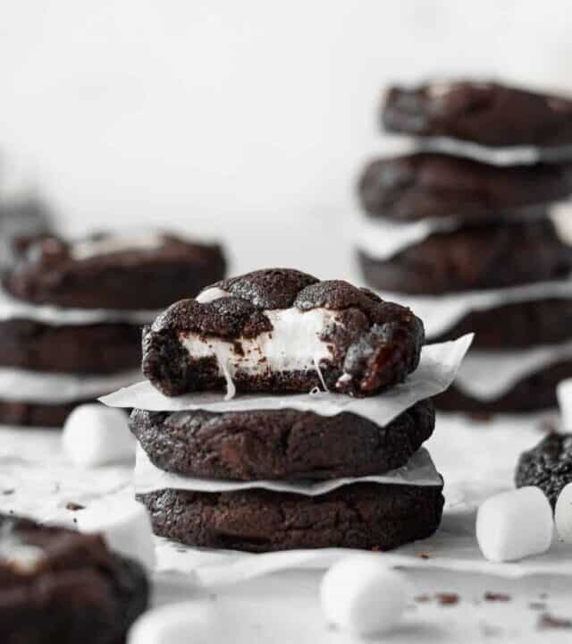 Stacks of marshmallow stuffed gluten-free chocolate cookies