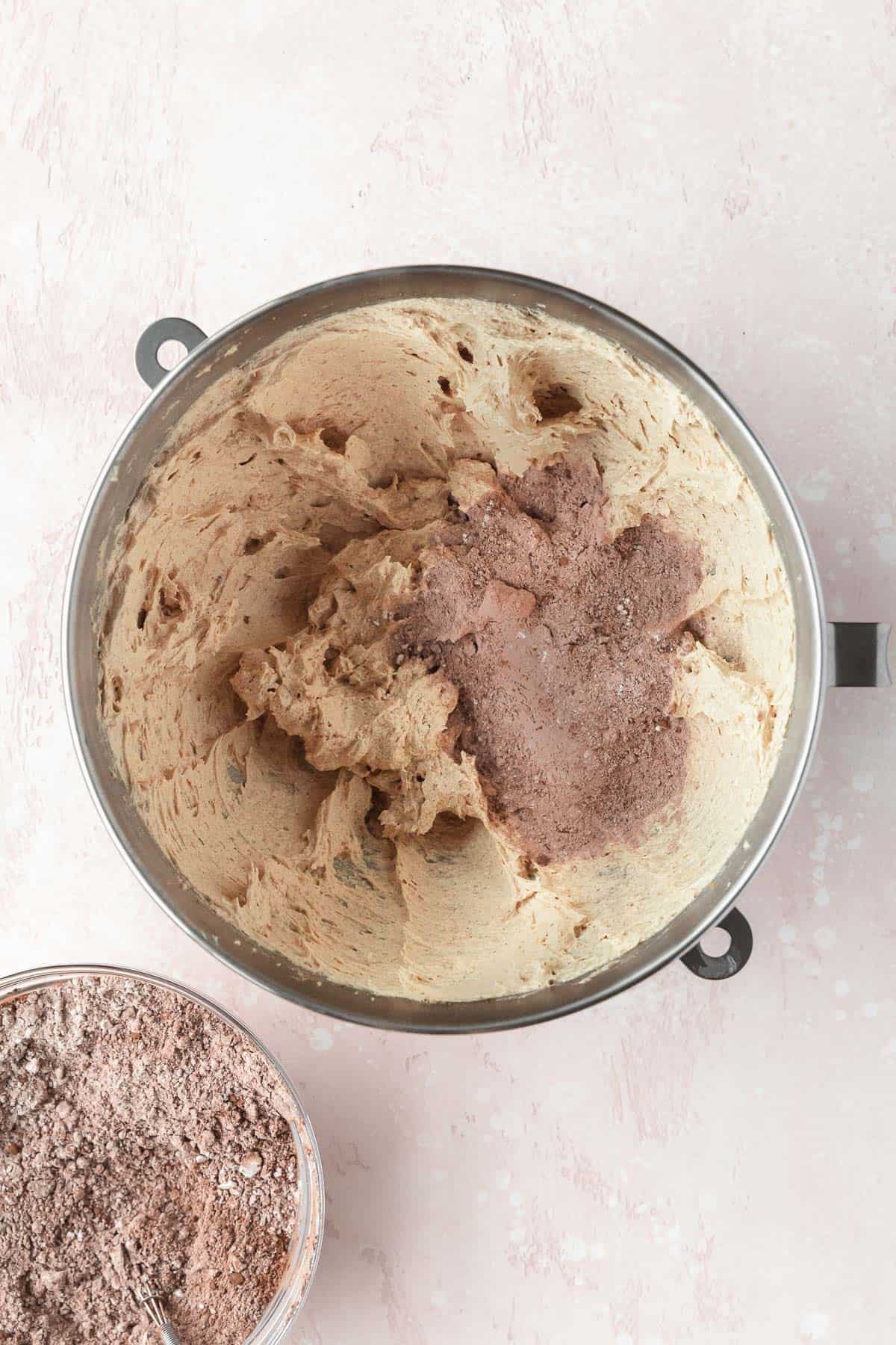 Dry ingredients added to the creamed butter a little at a time.