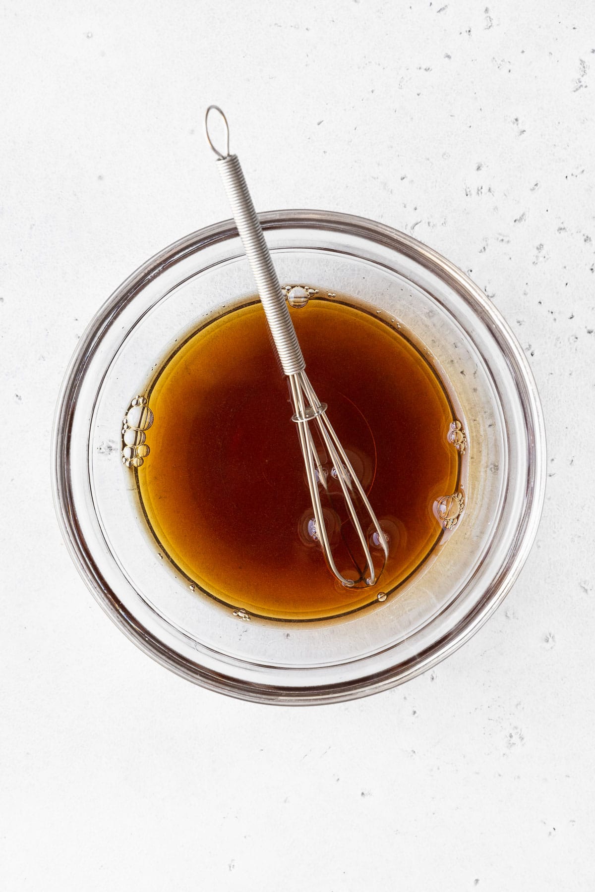 Mixing the brown sugar and hot water together in a small bowl.