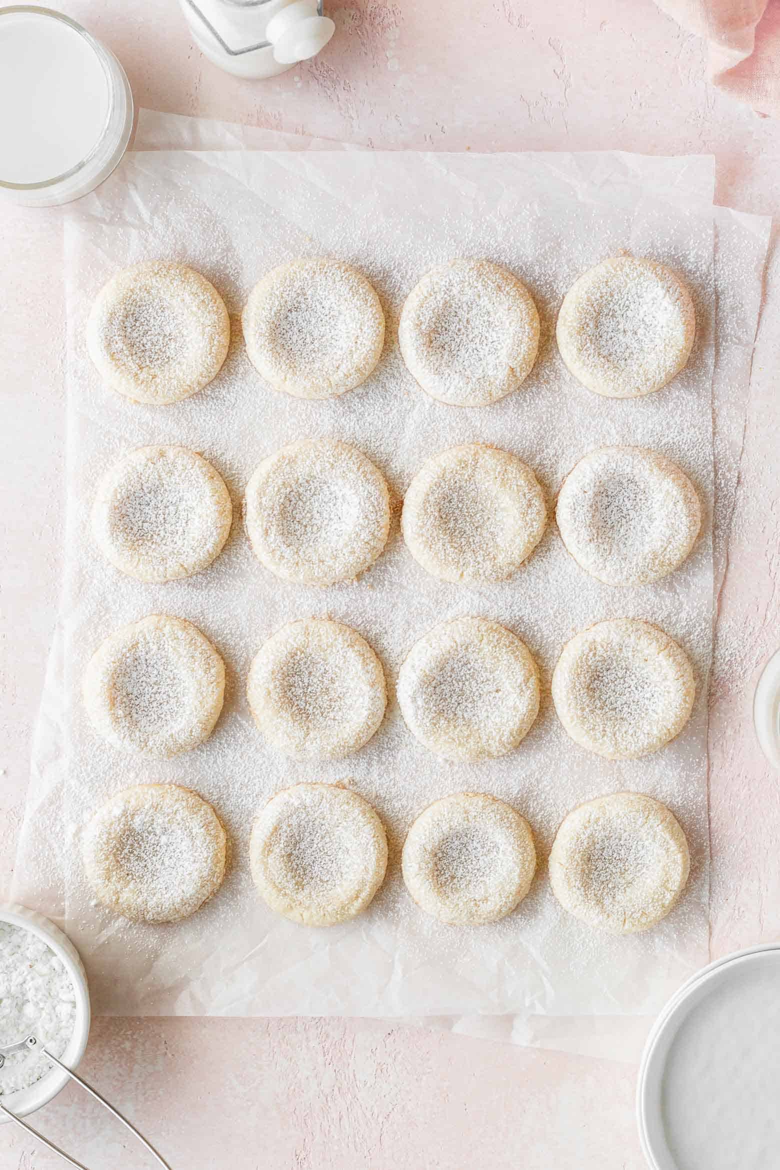 Cookies dusted with powdered sugar.