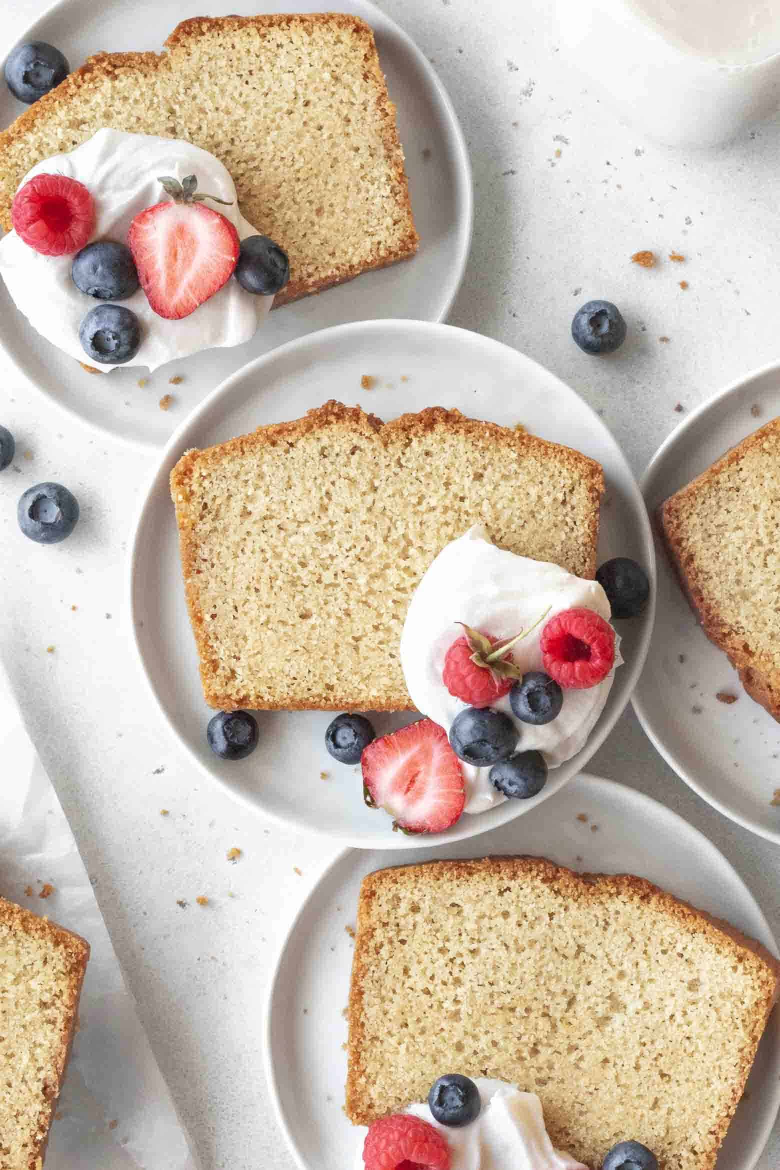 Tender gluten free pound cake on plates.