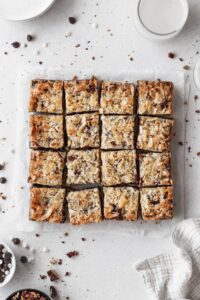 Vegan 7 layer bars cut into pieces.