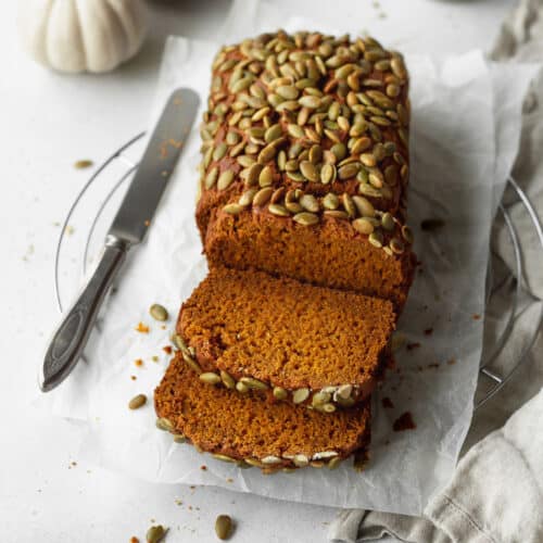 A sliced loaf of gluten free pumpkin bread.
