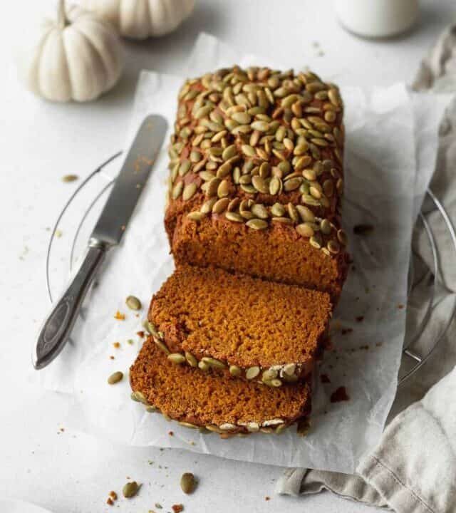 A sliced loaf of gluten free pumpkin bread.