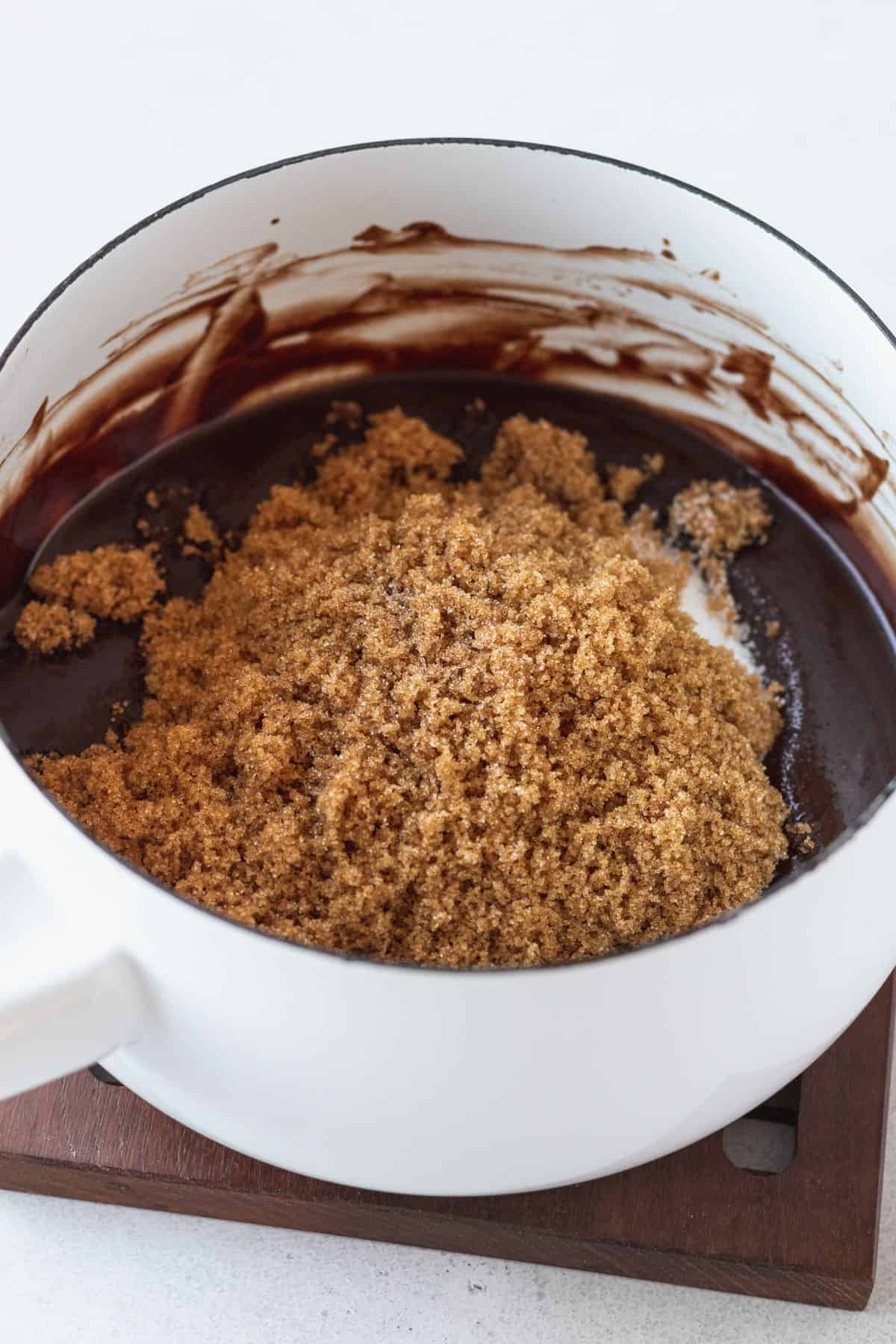 Sugars added to melted chocolate and butter.