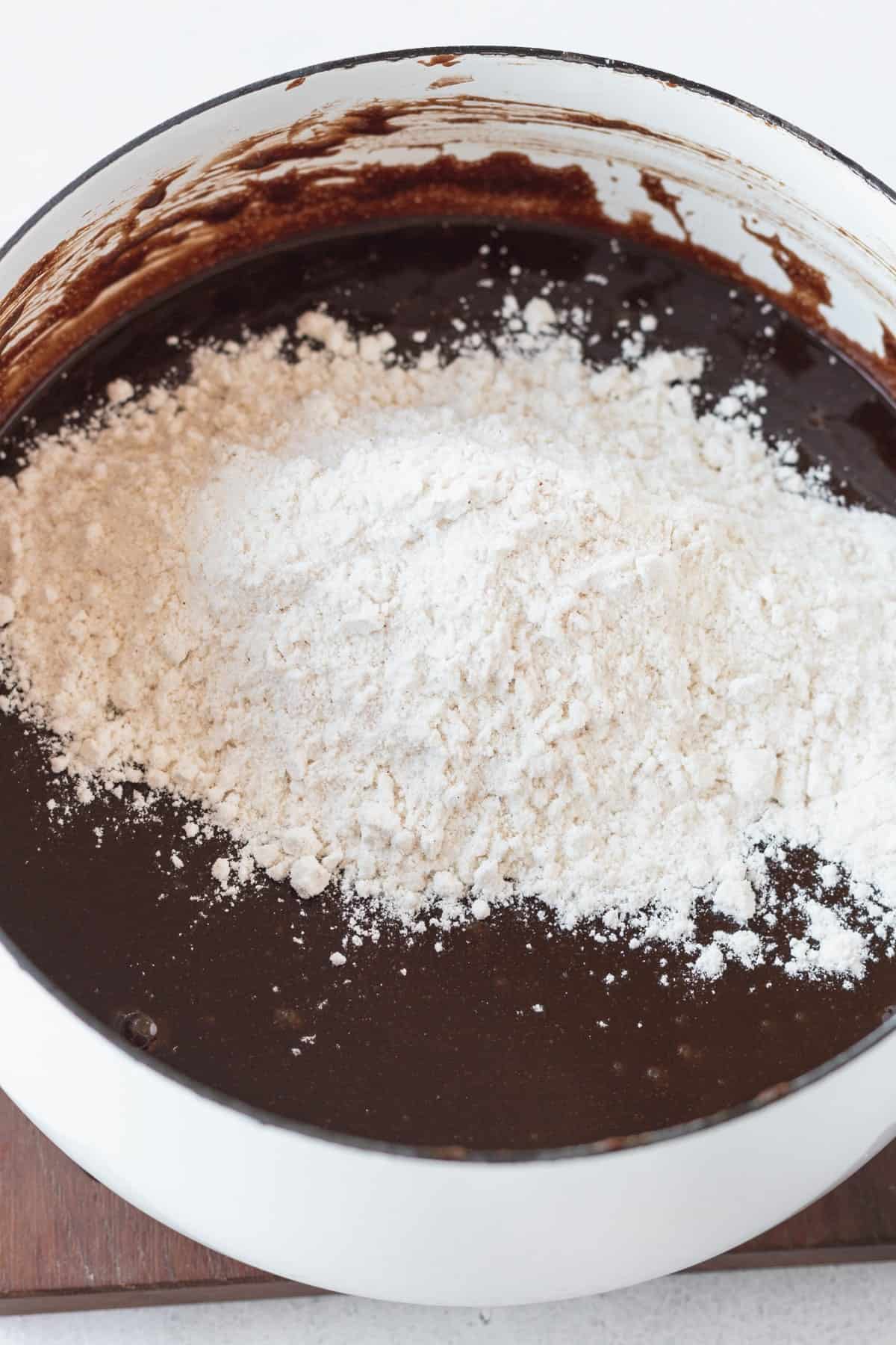 Dry ingredients added to GF brownie batter.