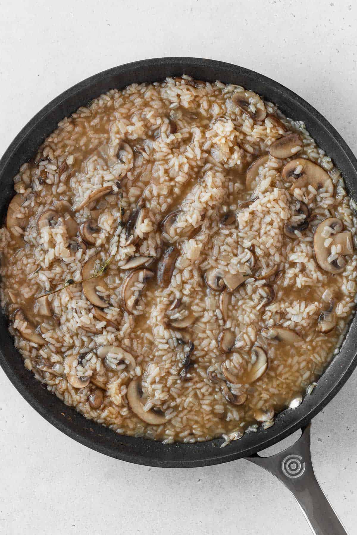 Mushroom risotto in a pan.