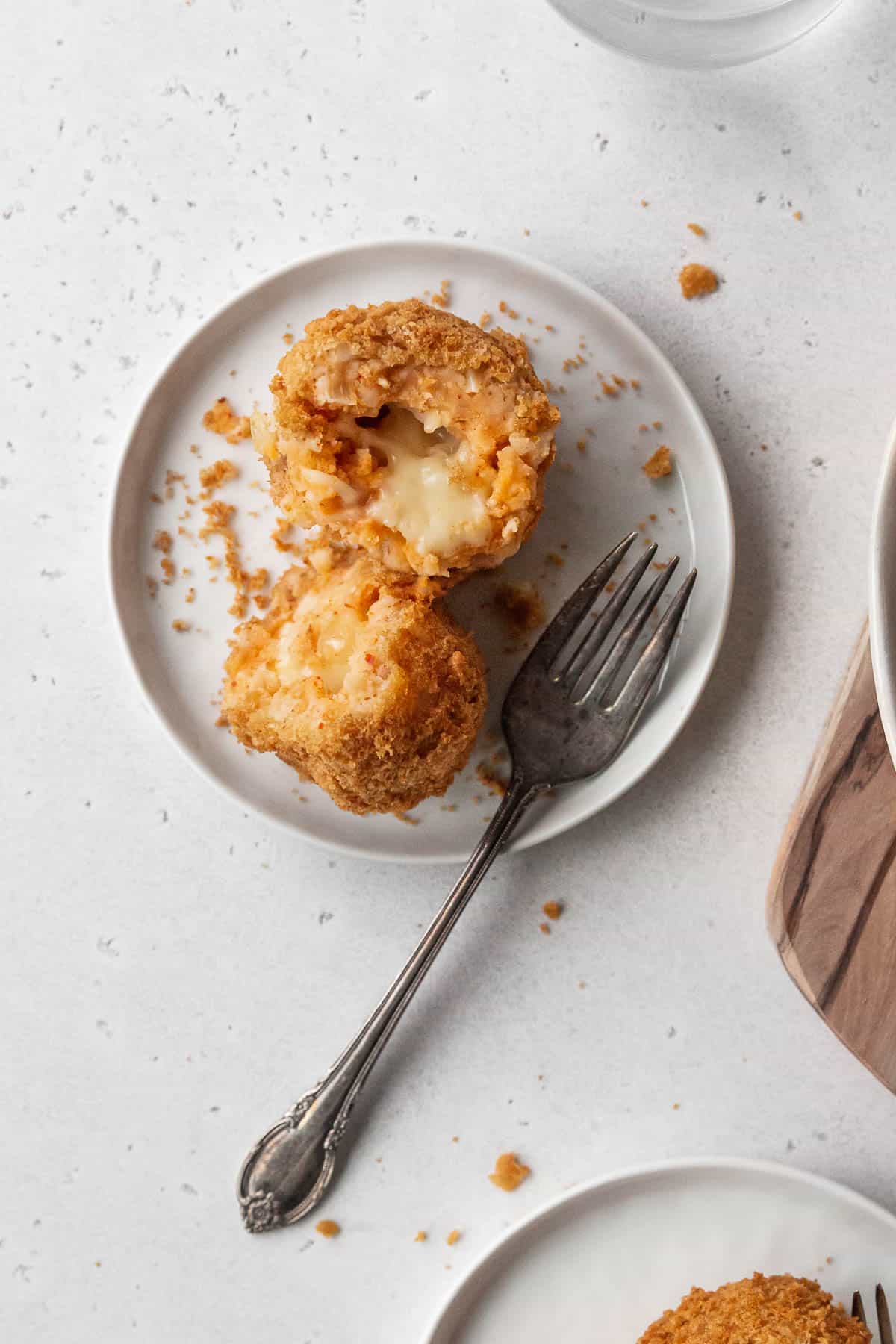 Closeup shot of the texture of a panko coated potato croquette.