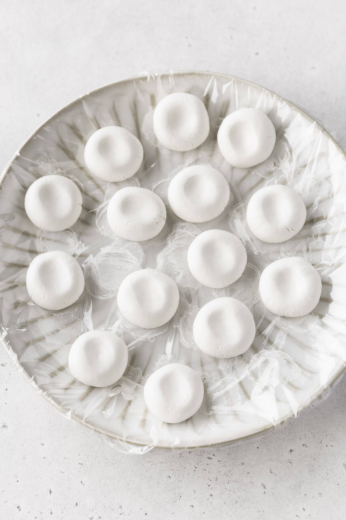 Shiratama dango dough with finger imprints, ready to be boiled.
