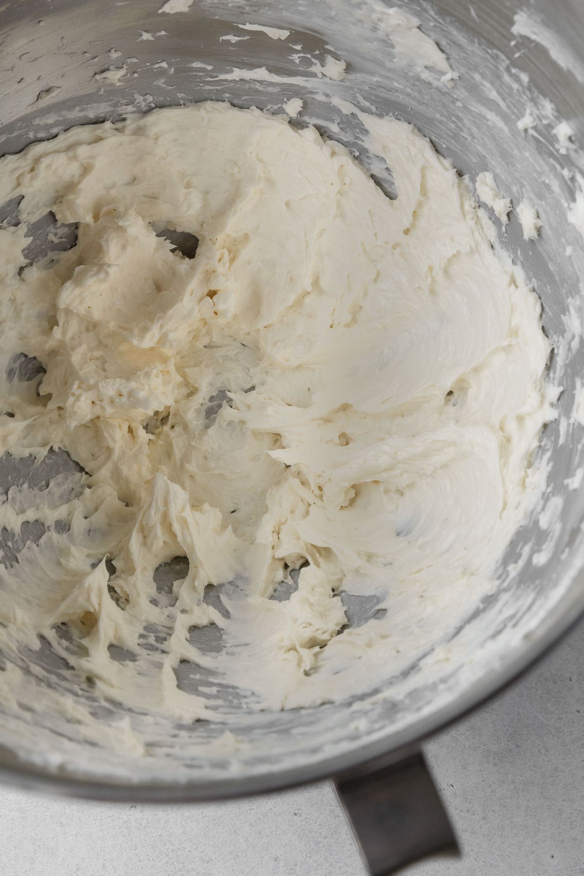 vegan butter and cream cheese in the mixing bowl.