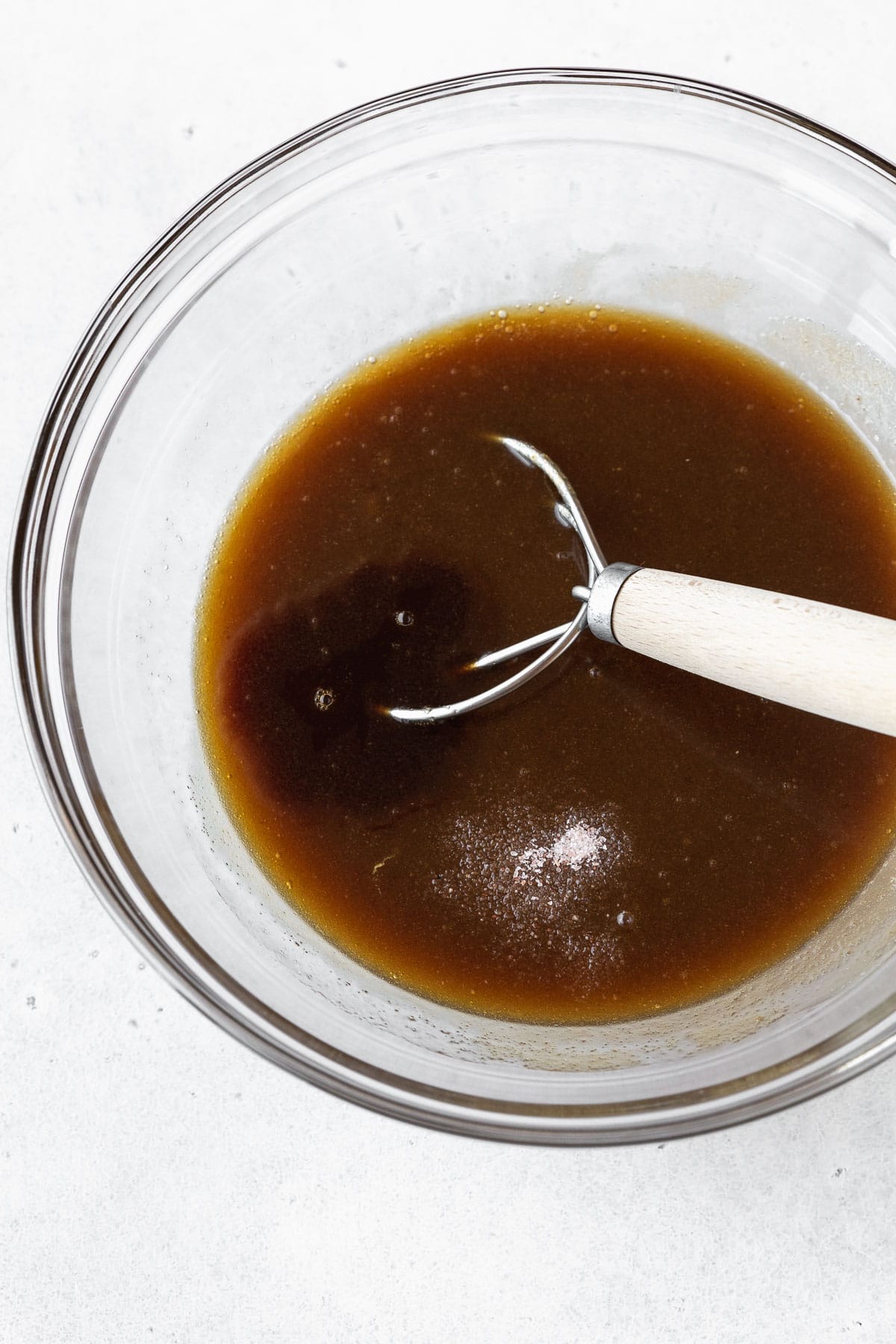 Butter and sugar after whisking together with a danish dough whisk.