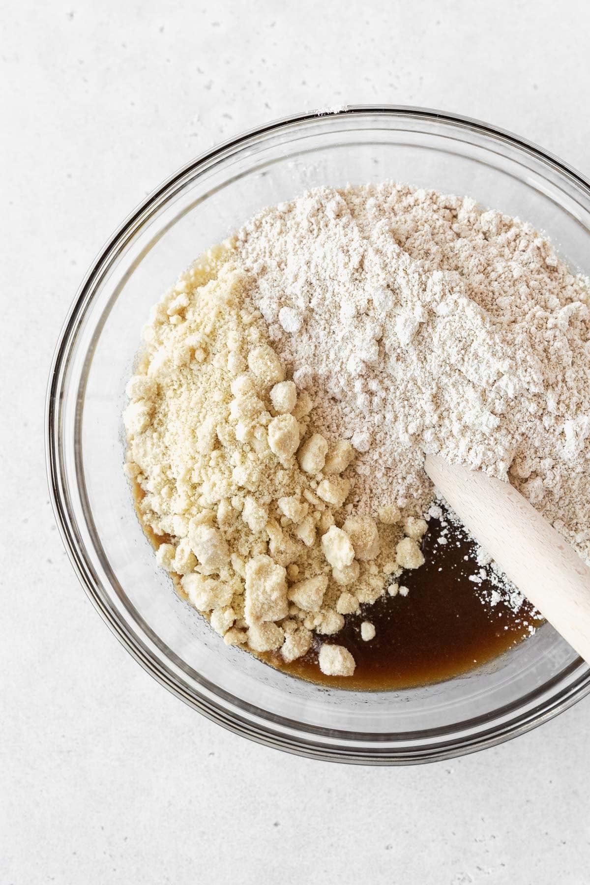 Step 2 for making vegan edible cookie dough -- almond and oat flours added to sugar-butter mixture.