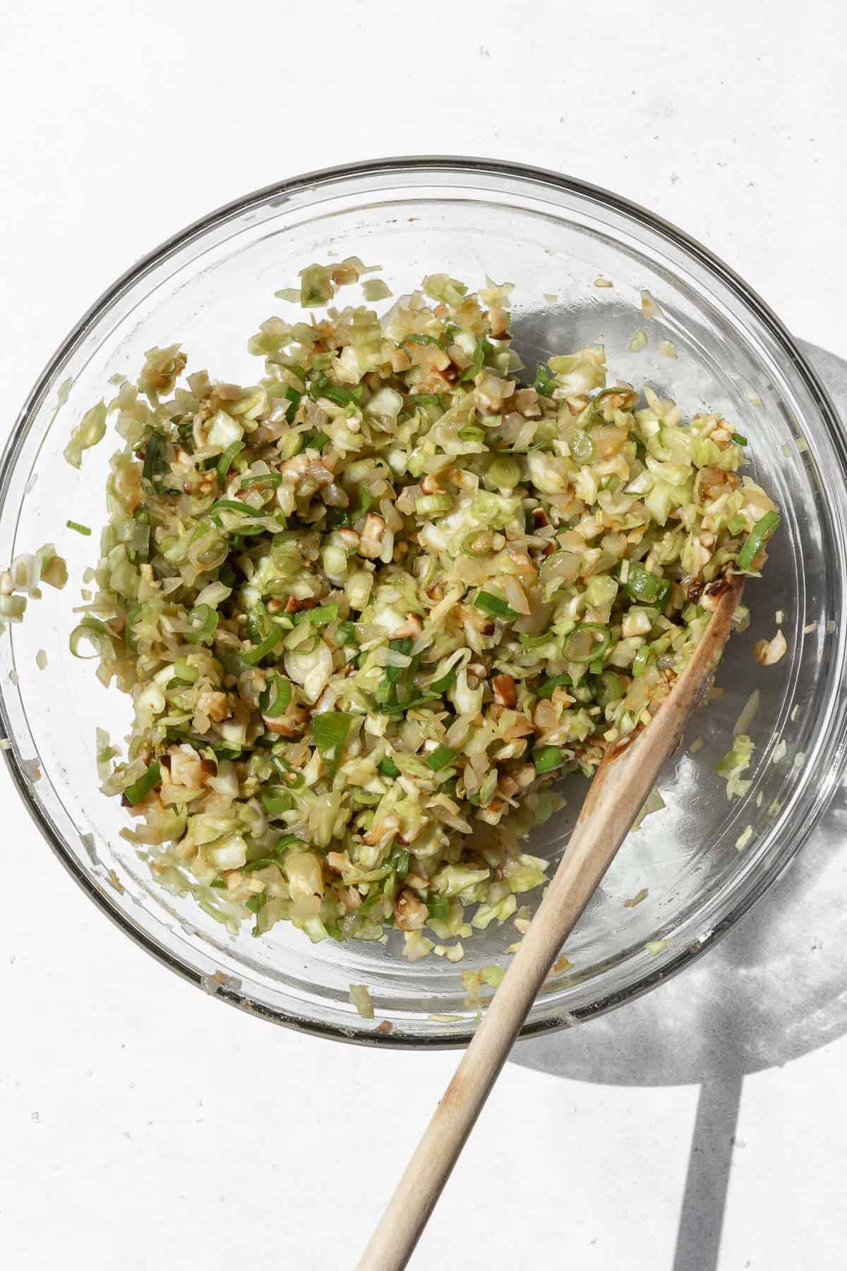 Vegetarian dumpling filling in a large bowl.