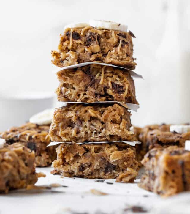A stack of the peanut butter banana oatmeal bars on the counter.