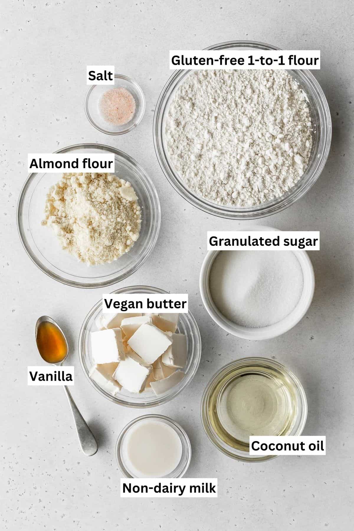 Easter egg sugar cookie ingredients measured out into bowls.