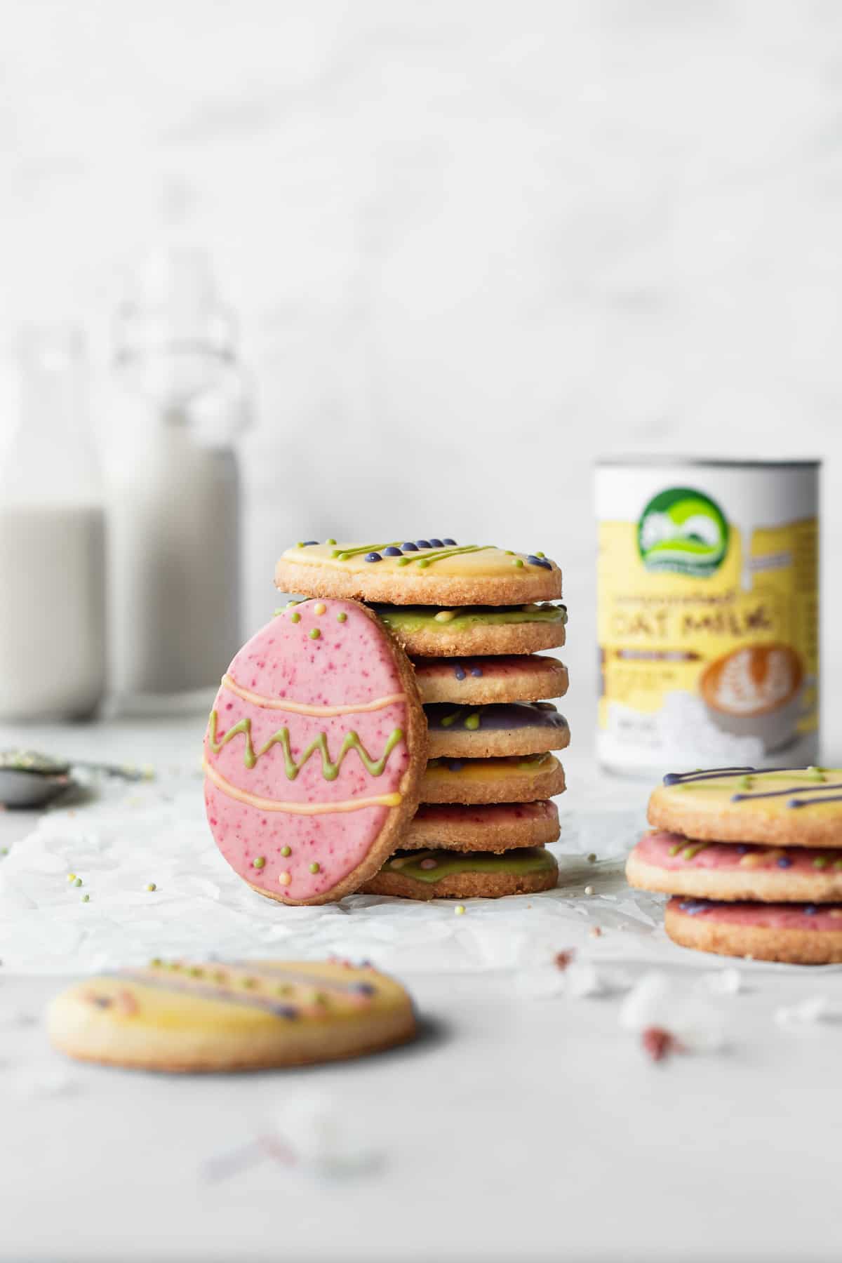 A stack of Easter cookies decorated with colorful icing.