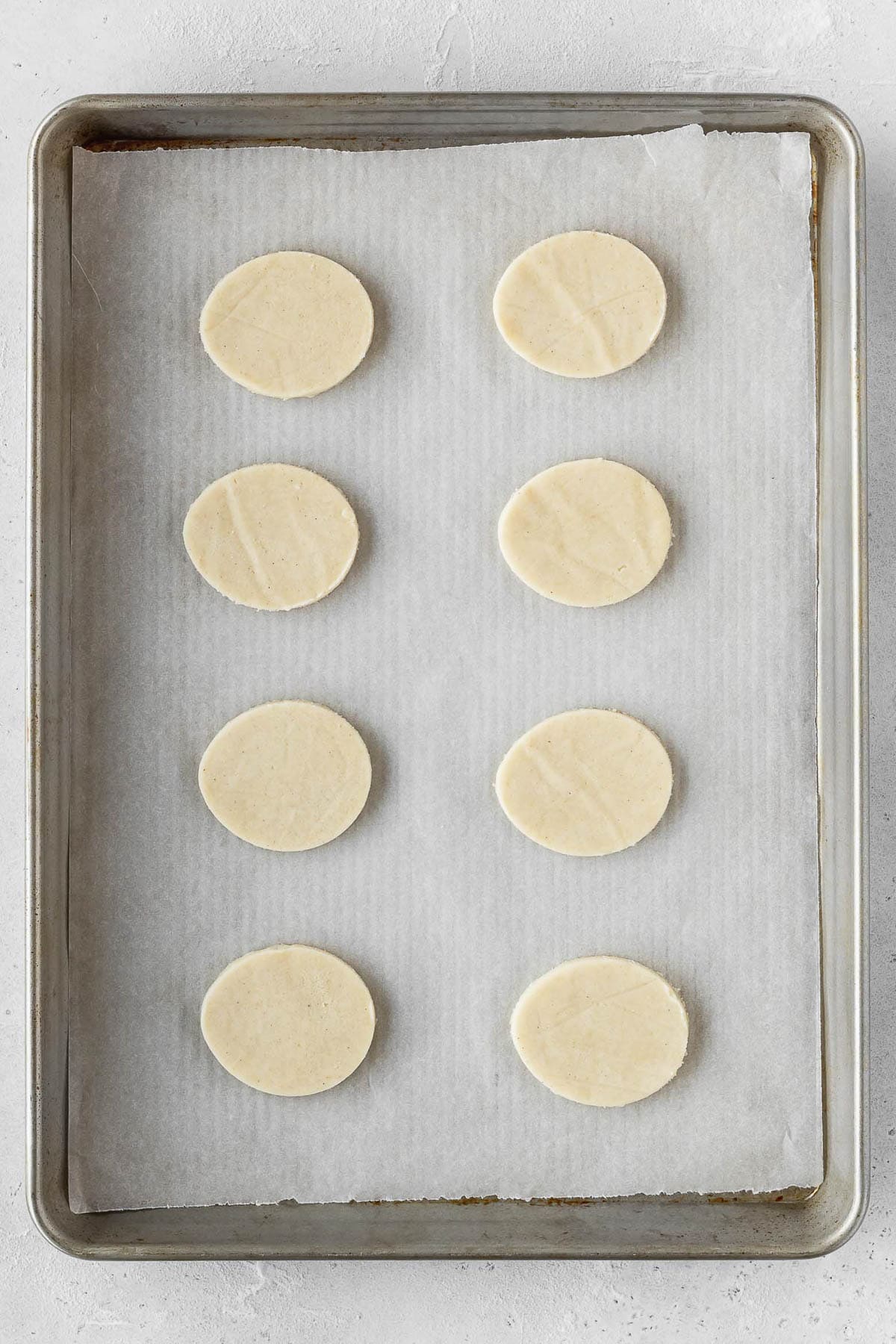 Easter sugar cookie dough on a baking sheet.