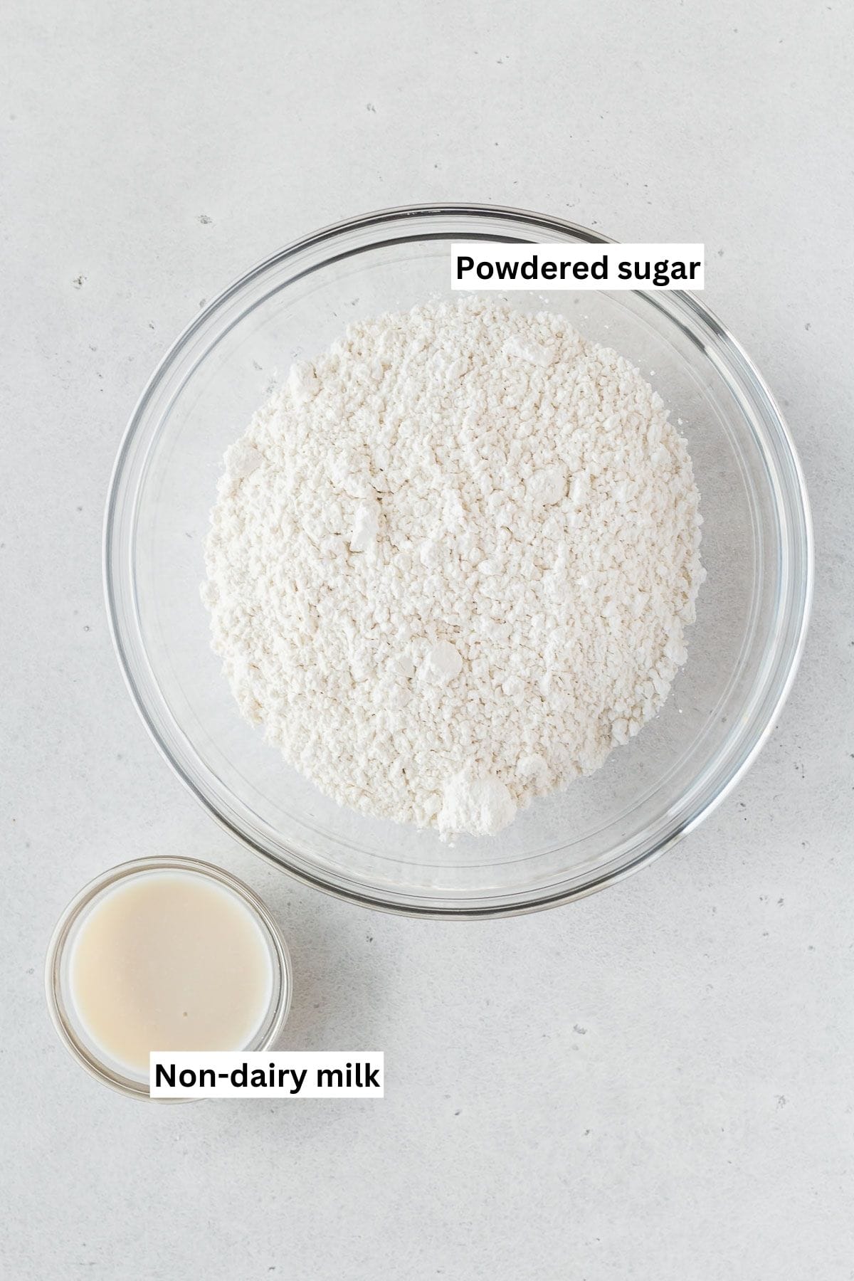 Vegan cookie glaze ingredients in bowls.