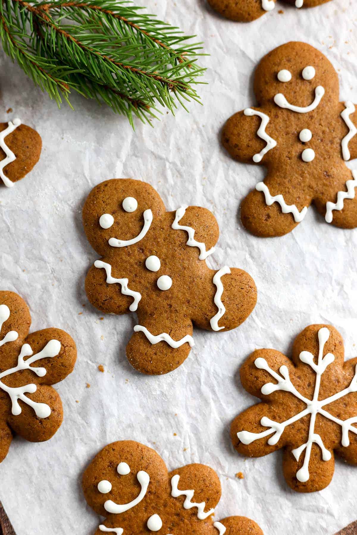 Gingerbread cookies decorated with white icing.